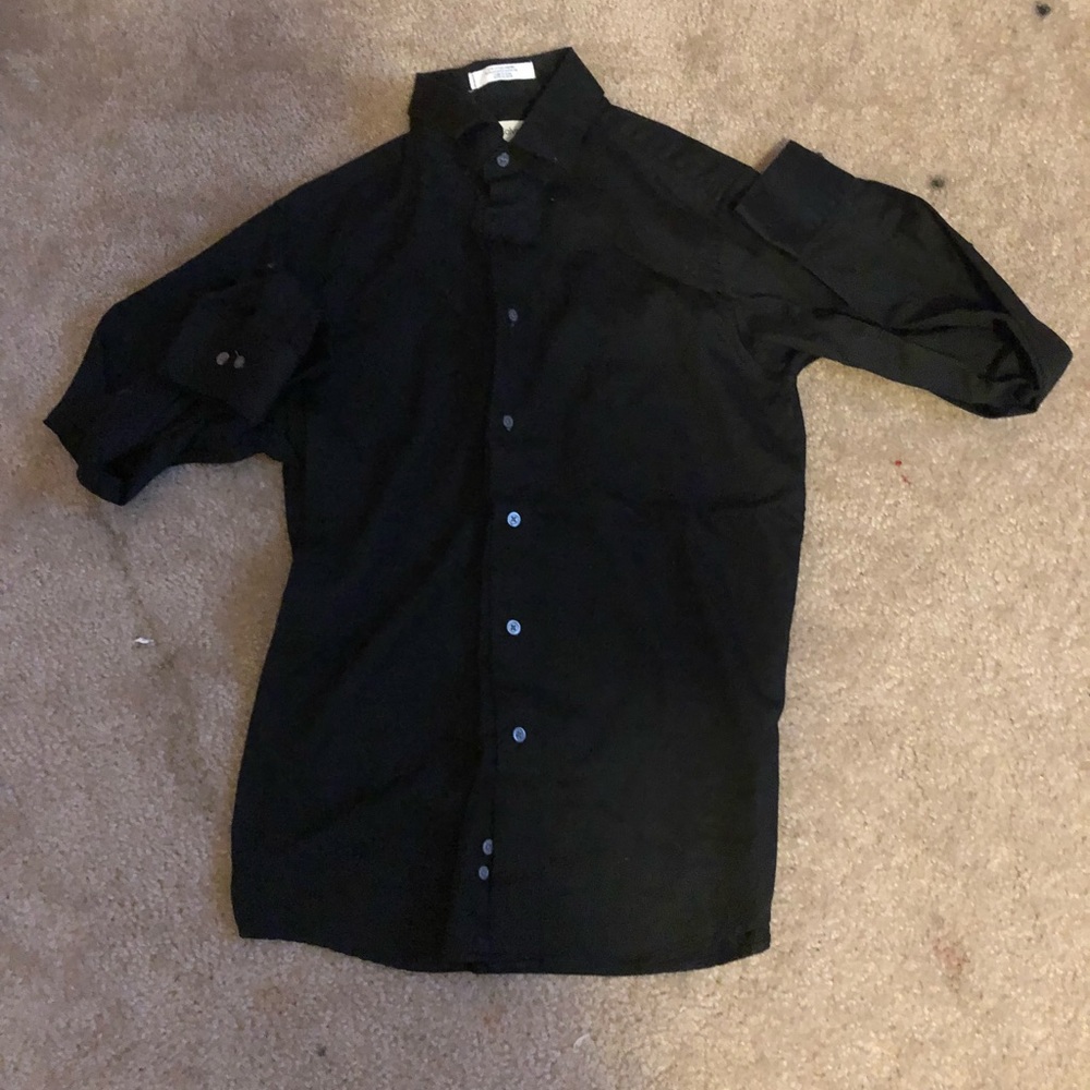 I am selling a Calvin Klein button up shirt